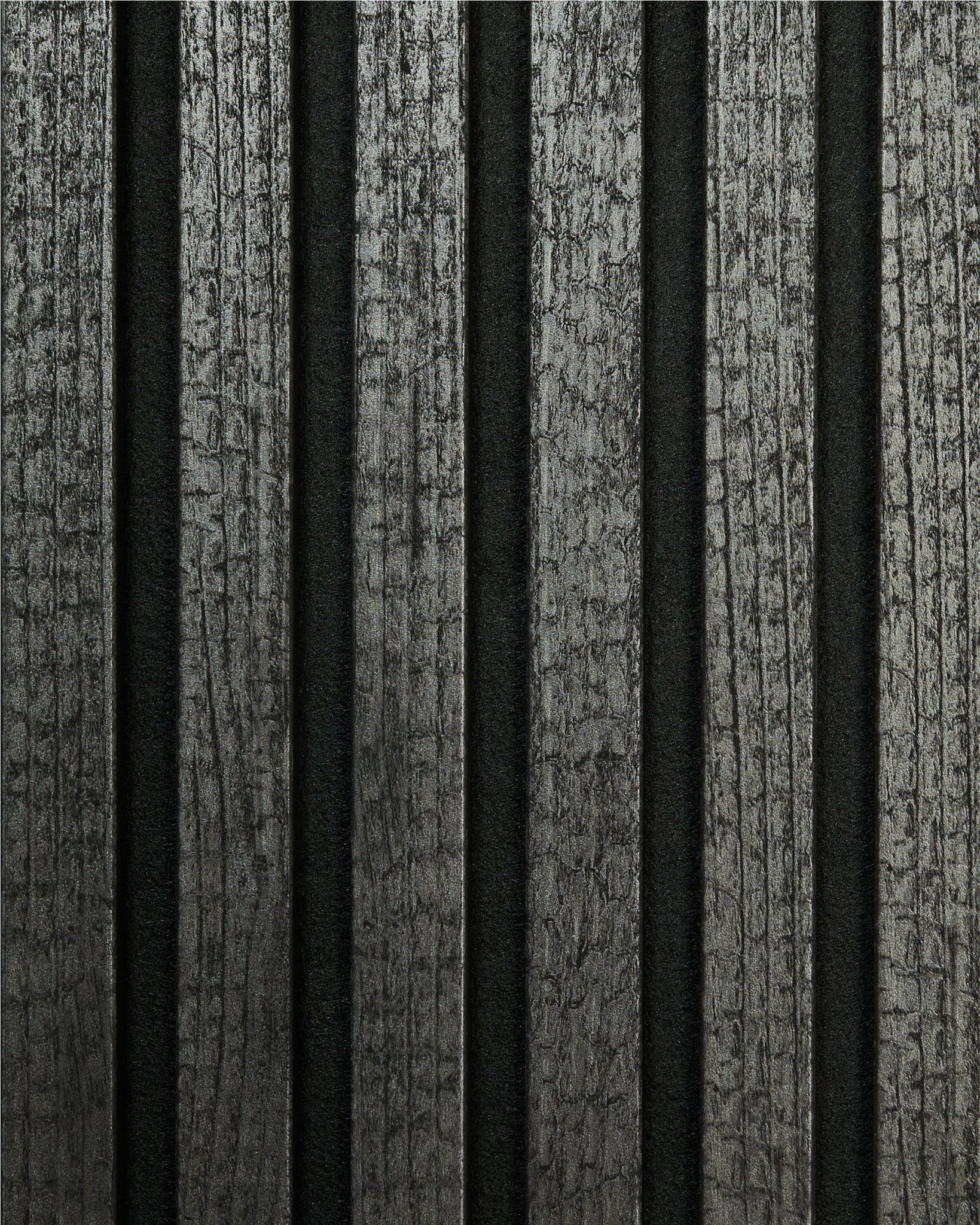 The Rebel | Sample / Charcoal di WoodUpp presenta vertical, doghe acustiche in legno carbonizzato con una finitura scura e materica per un look nordico moderno.