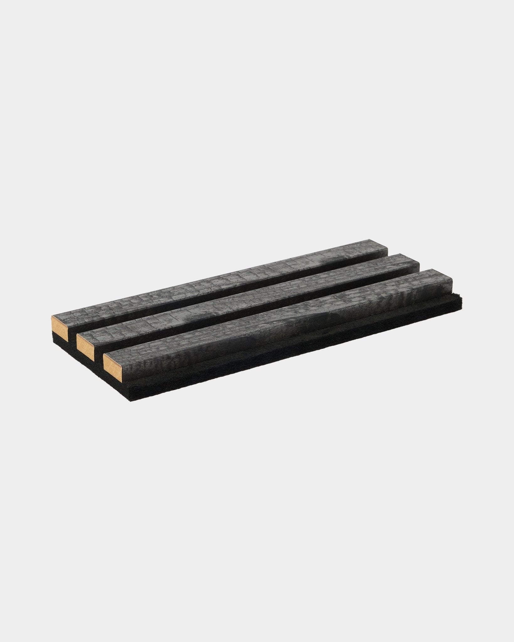 Il campione del sottopentola Rebel charcoal di WoodUpp, realizzato con quattro doghe in legno black, esprime durata e design nordico minimalista per gli accessori Pannello acustico.